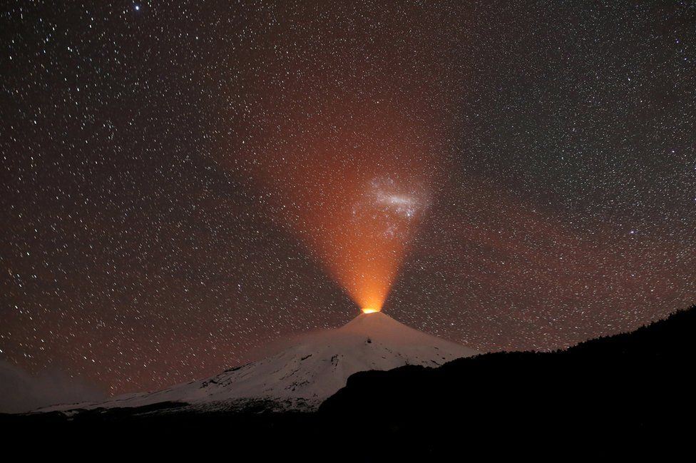 The Villarrica Volcano is seen at night from Pucon town, Chile