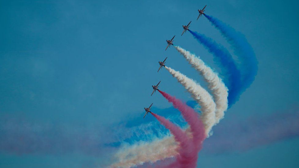 The Red Arrows Aerobatic Team of the RAF fly over Falmouth Bay, in Falmouth, Cornwall