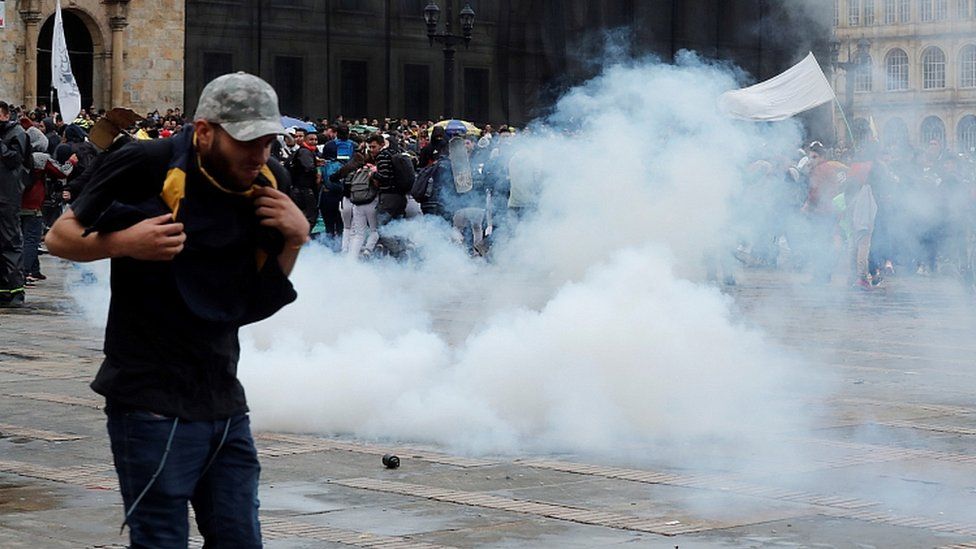 Police disperse protesters with tear gas in Plaza Bolivar in Bogota, Colombia 22 November 2019
