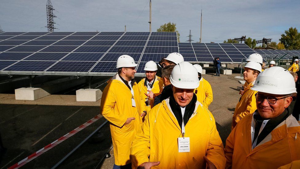 Workers at the solar panel plant at the Chernobyl nuclear power plant, Ukraine on 5 October 2018