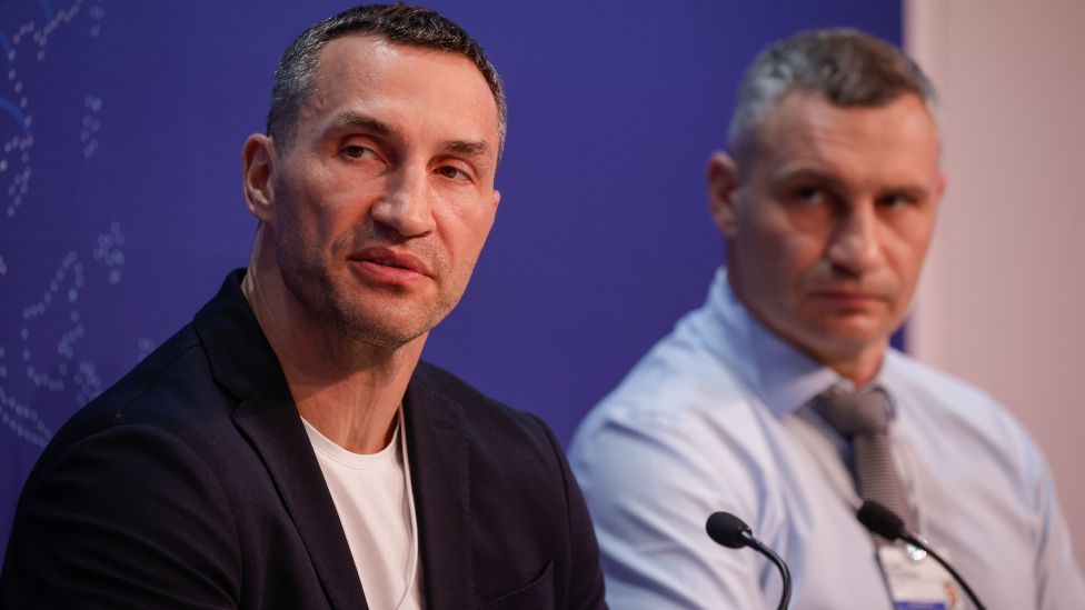 Former heavyweight champion boxers Vitali Klitschko, Kyiv Mayor, right, and his brother Wladimir Klitschko during a panel session on the opening day of the World Economic Forum (WEF) in Davos, Switzerland, on Monday, May 23, 2022.