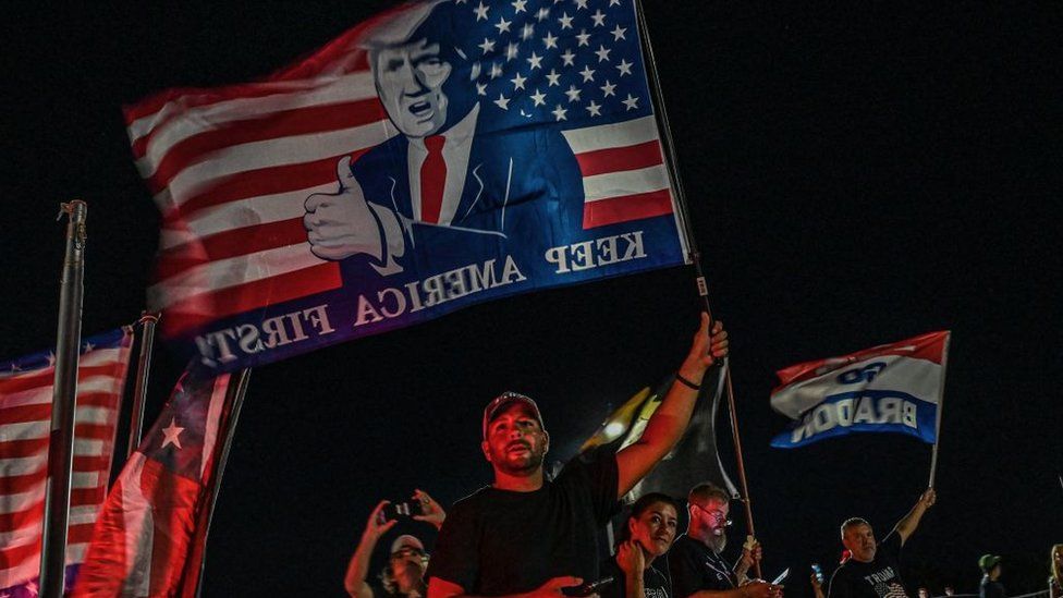 Supporters of Donald Trump flocked to his Mar-a-Lago home on Monday night as news of the FBI search broke