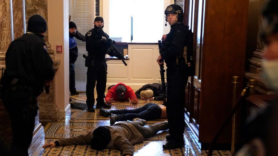 Capitol police detain protesters inside the building