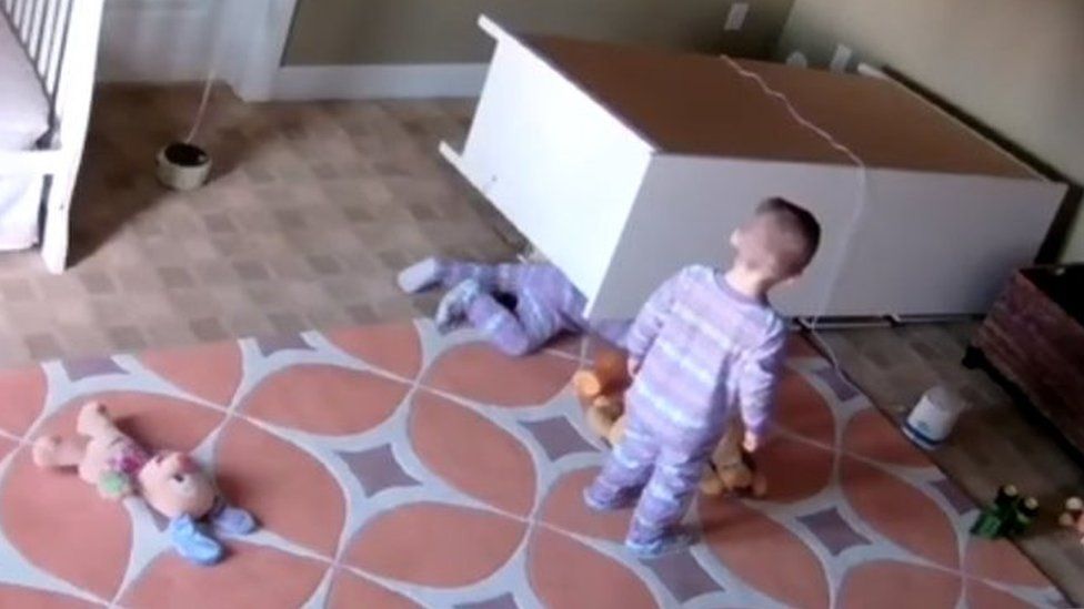 dresser falls on young child