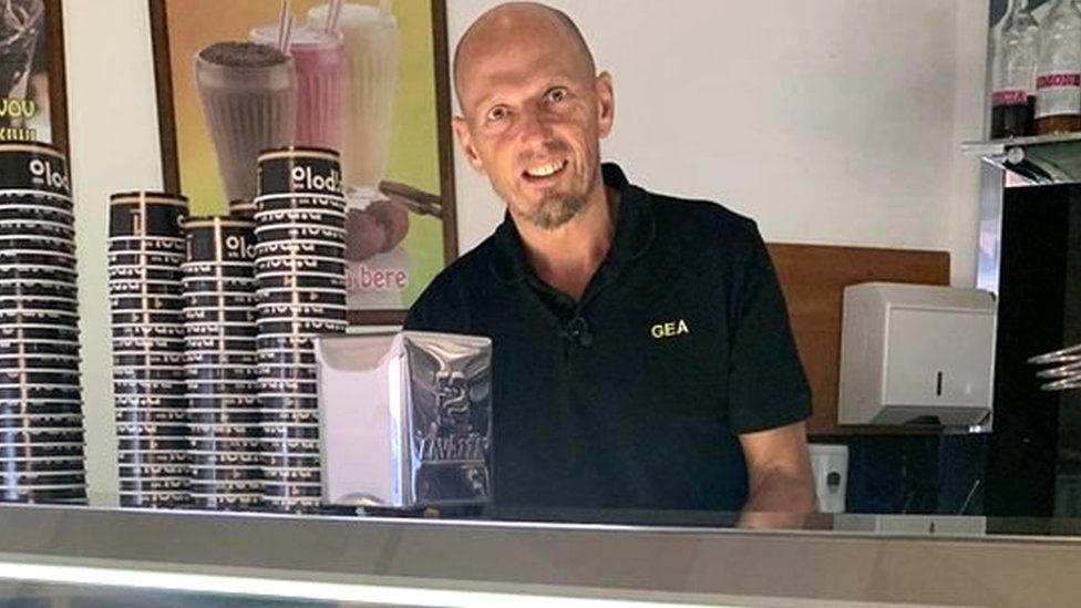 Ice-cream shop owner, Gianadrea Pipolo at his shop