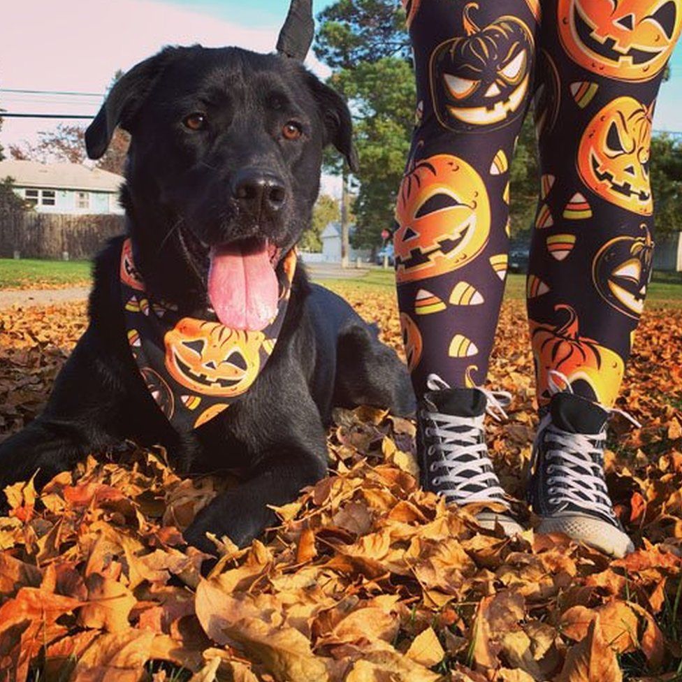 Krista Kuppenbender and her dog wear a matching leggings and bandana combination