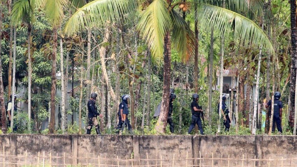 Security personnel get ready for raid in Nasirpur village, Moulvibazar, northeast of the capital Dhaka, Bangladesh, March 30, 2017.