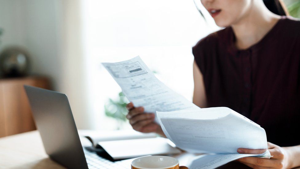 Woman looking at documents