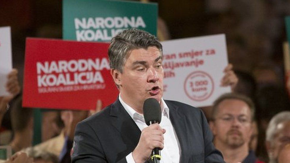 Centre-left leader Zoran Milanovic talks to supporters at a rally in Zagreb on 7 Sept