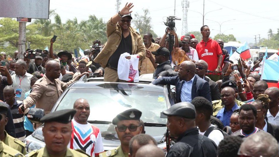 Former presidential candidate of Chadema, Tundu Lissu, waves to supporters as his convoy drives after he returns from exile in Europe, along the streets of Dar es Salaam, Tanzania - 25 January 2023