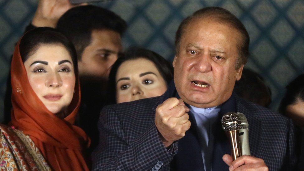 Nawaz Sharif (R), former prime minister and leader of the Pakistan Muslim League Nawaz (PML-N), stands next to his daughter Maryam Nawaz (L) as he speaks to supporters in Lahore, Pakistan, 09 February 2024