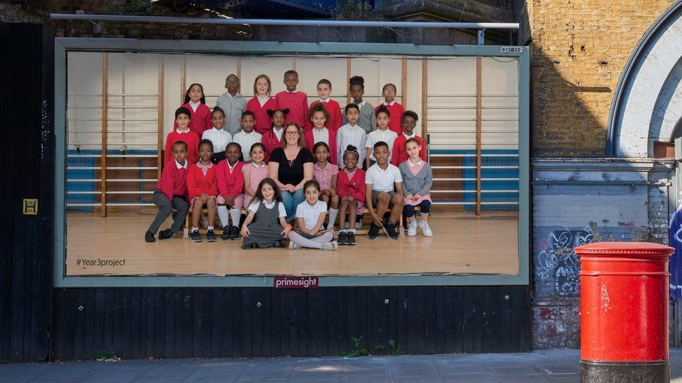 Billboard with a class photograph of a Year Three class