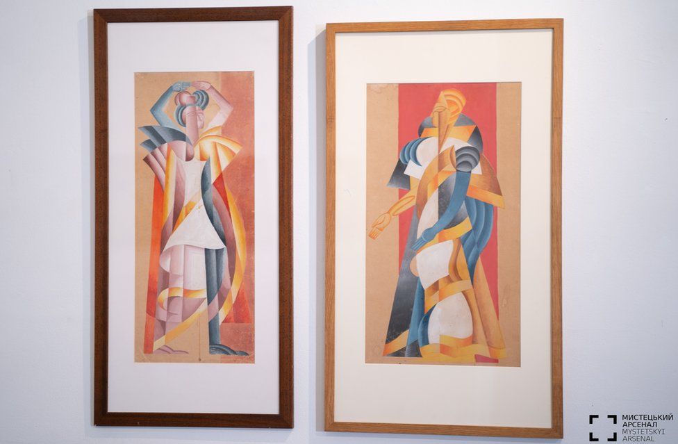 Two paintings on display at the Mystetskyi Arsenal in Kyiv