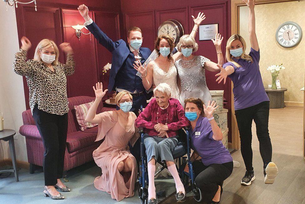 Audrey Dear with her granddaughter Holly Kennedy and husband Steve Kennedy after they recreated their wedding at the 91-year-old"s care home in Orpington, Kent