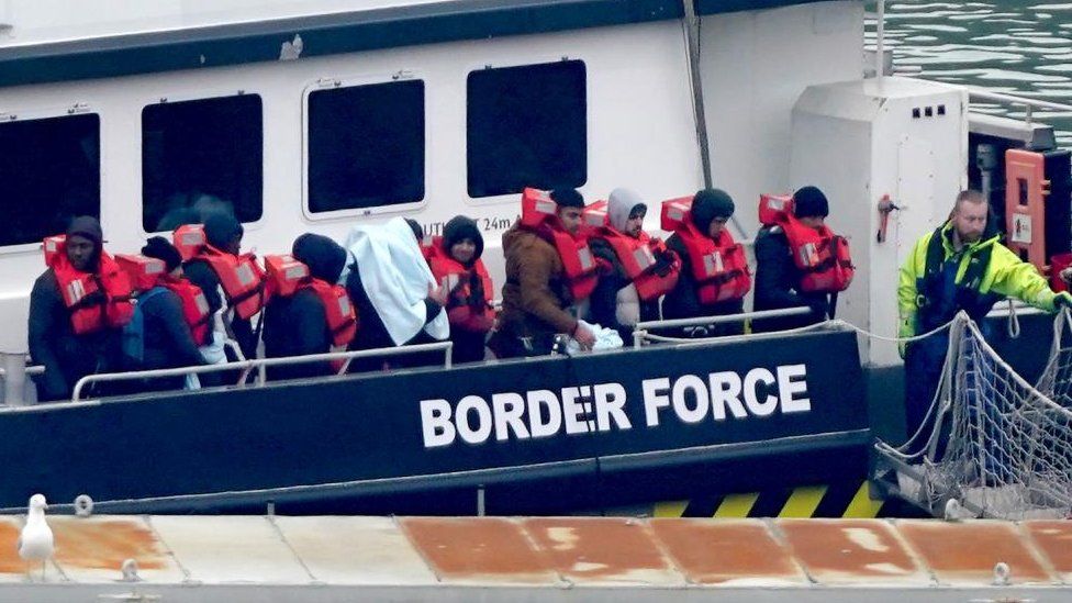 A group of people thought to be migrants are brought in to Dover onboard a Border Force vessel, following a small boat incident in the Channel