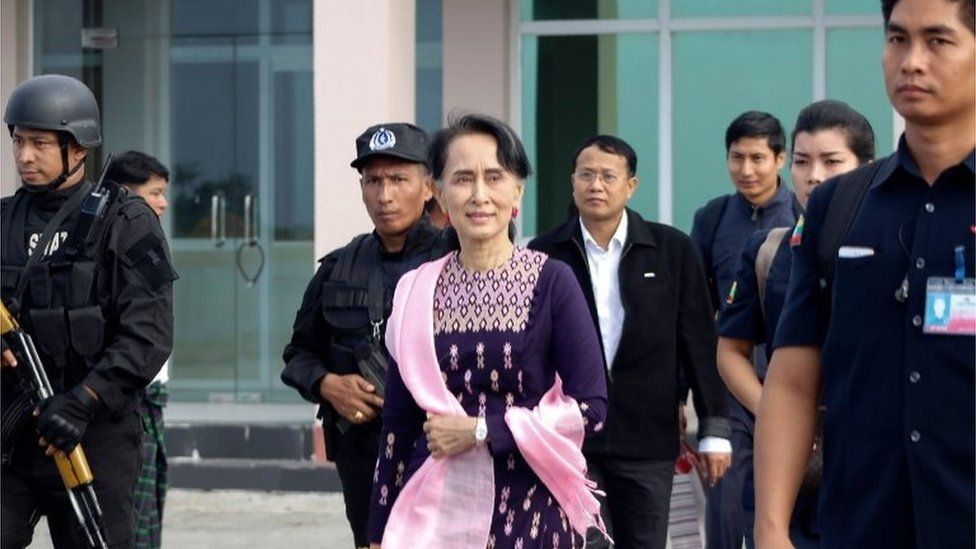 Aung San Suu Kyi (centre) at Sittwe airport. Photo: 2 November 2017