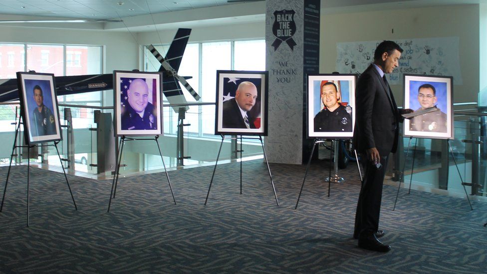 Portraits of the five fallen officers at Dallas police headquarters