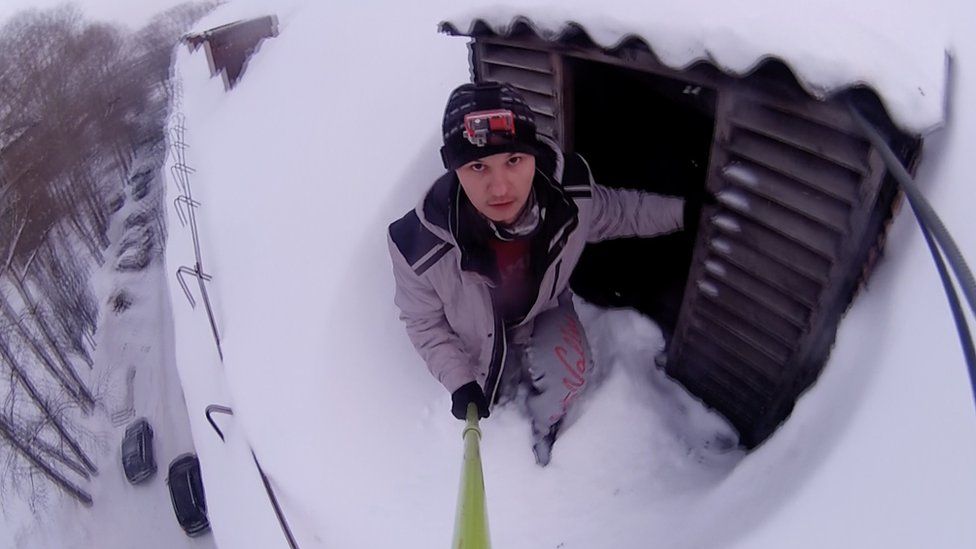 Screengrab from Alexander Chernikov holding a selfie stick