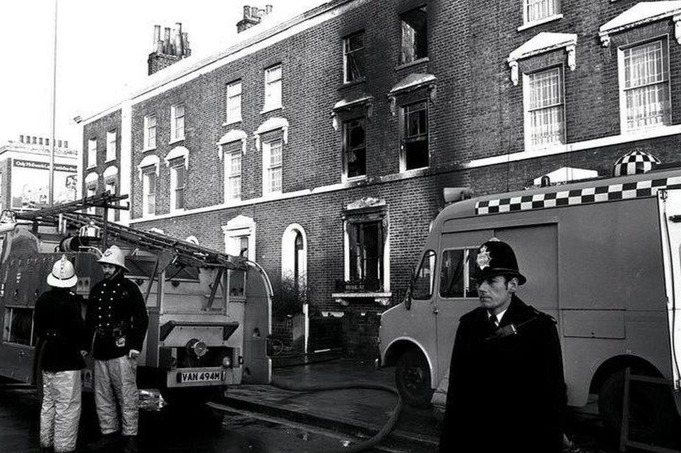 Emergency officers at the scene of the New Cross fire