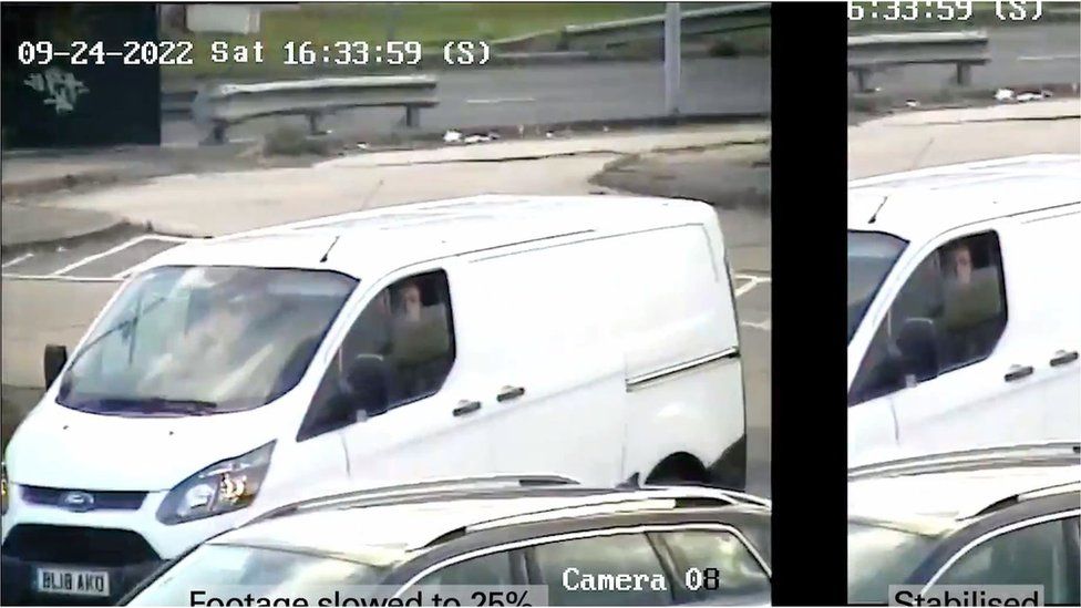 White van with a driver and passenger