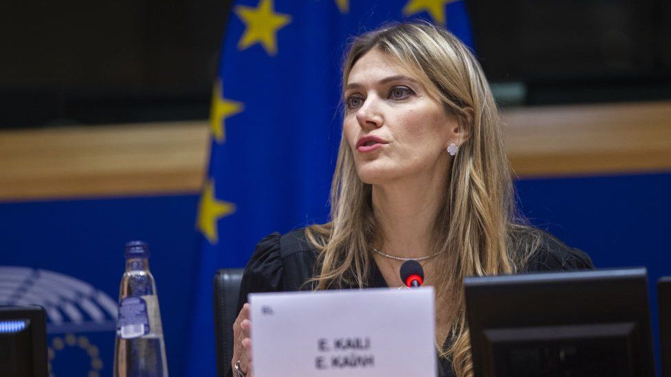 Eva Kaili with EU flag behind her