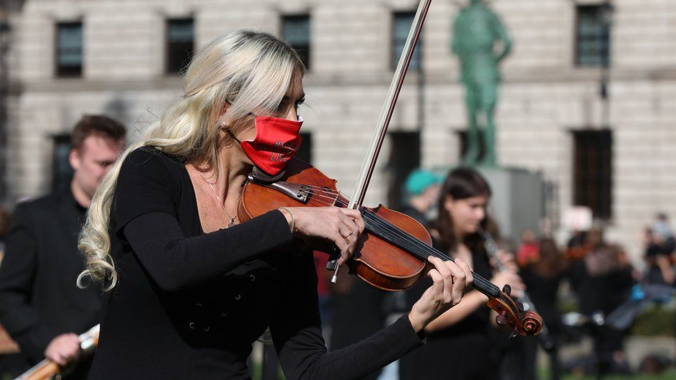 Musicians protest outside Parliament in Westminster, London