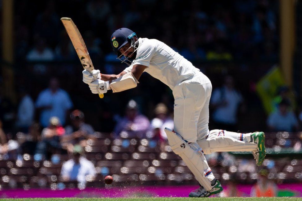 India batsman Cheteshwar Pujara hits a ball on the second day of the fourth and final cricket Test against Australia at the Sydney Cricket Ground on January 4, 2019.