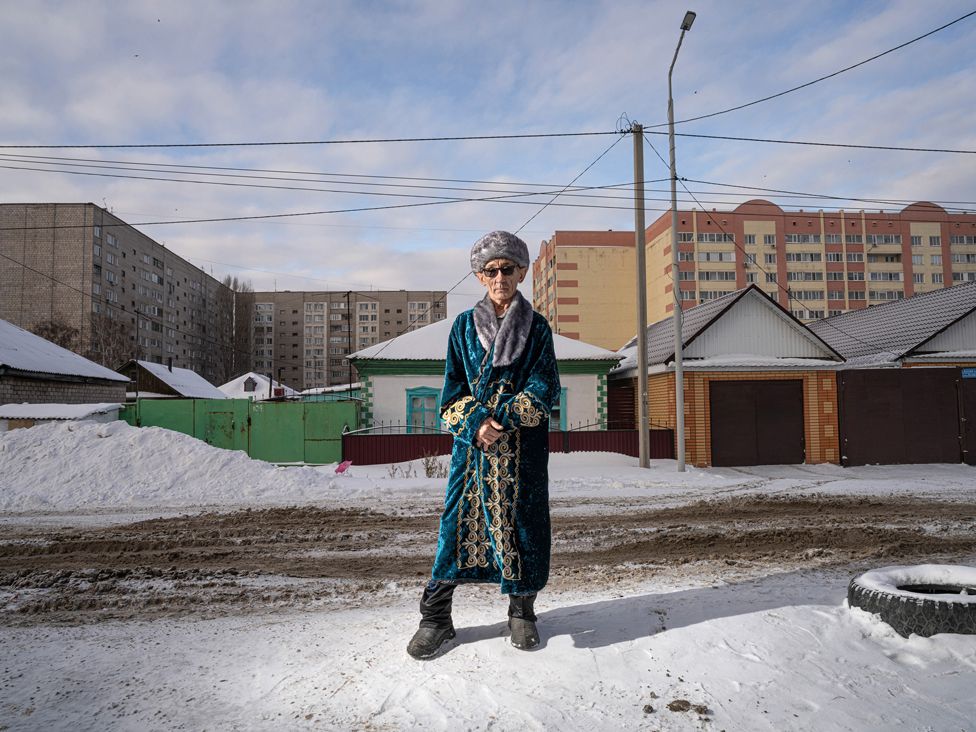 Portrait of a man in Kazakhstan wearing a traditional clothing