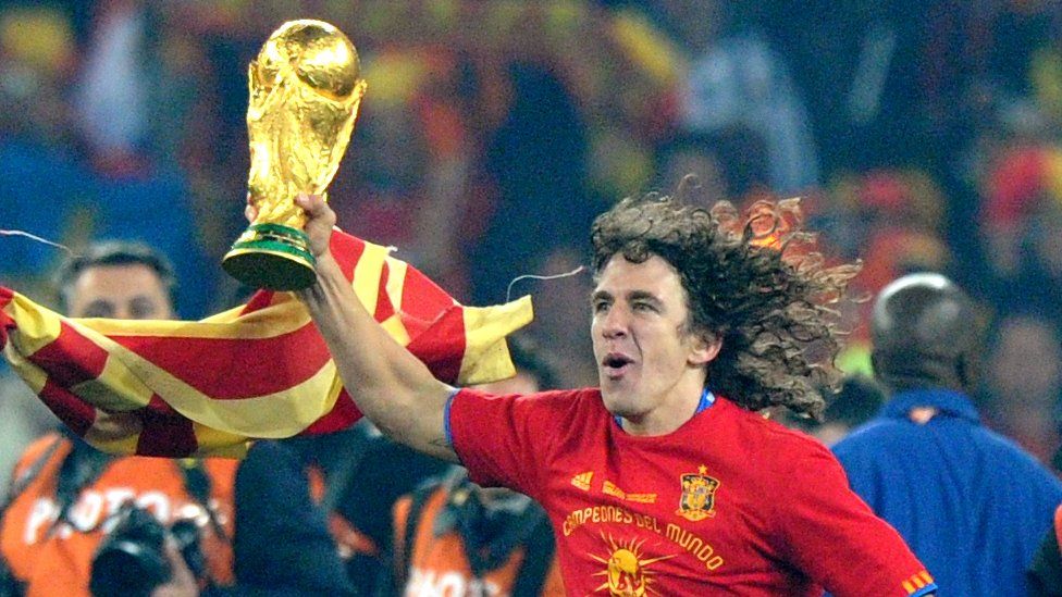 Carles Puyol celebrates winning the 2010 World Cup.
