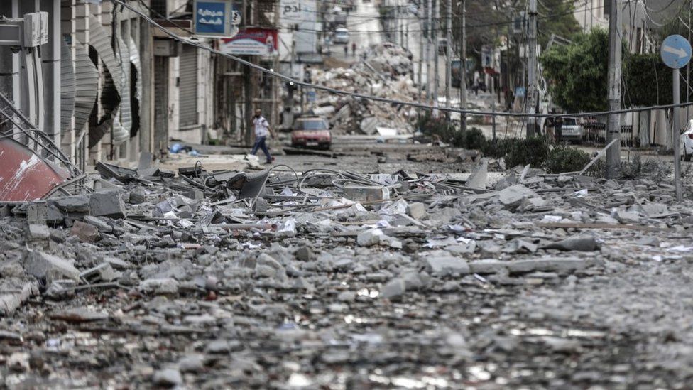 Damaged street is seen after Israeli warplanes strike headquarters of the Qatari Red Crescent Society in al-Rimal neighborhood of Gaza City, Gaza on May 17, 2021