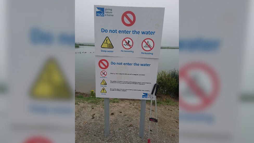 A sign telling people not to go into the water