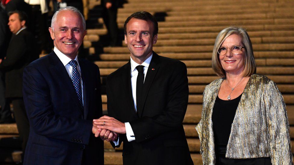 French President Emmanuel Macron (centre) meets with Australian Prime Minister Malcolm Turnbull and his wife Lucy Turnbull at the Sydney Opera House on May 1, 2018 in Sydney, Australia.