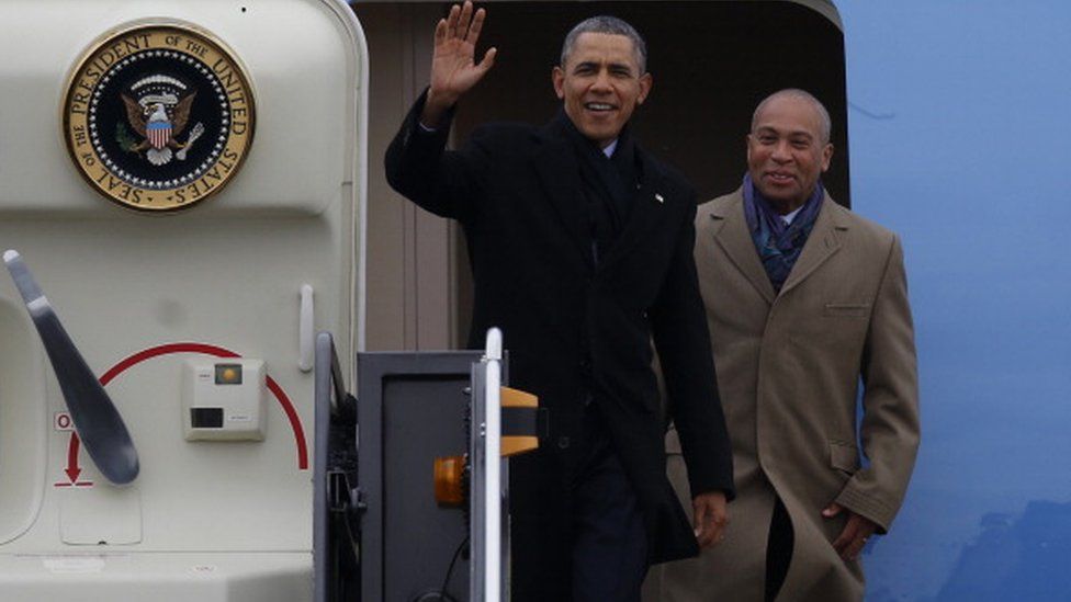 President Barack Obama arrives at Logan Airport with Governor Deval Patrick as they depart Air Force One in Boston, Mass. on March 5, 2014