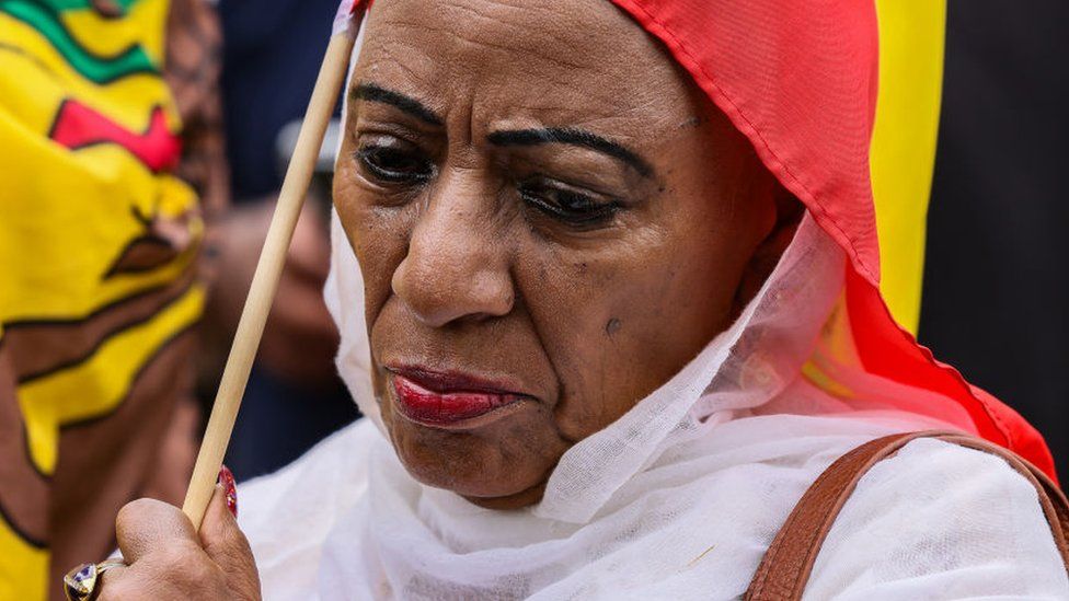 A member of the Washington DC Ethiopian community takes part in a demonstration outside of the U.S. State Department to protest attacks by the Ethiopian government on ethnic Amharas and the Amhara region in Ethiopia on August 10, 2023, in Washington, DC. Since April of 2023, large protests have erupted throughout the Amhara region denouncing the federal government's campaign to dismantle Amhara regional and Fano forces