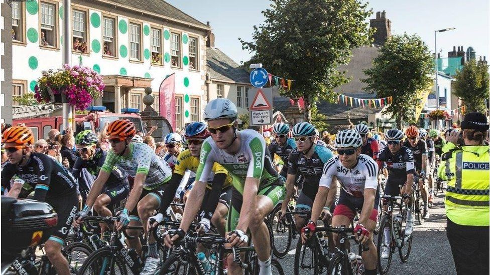 Tour of Britain 2015 riders pass Wordsworth House in Cockermouth