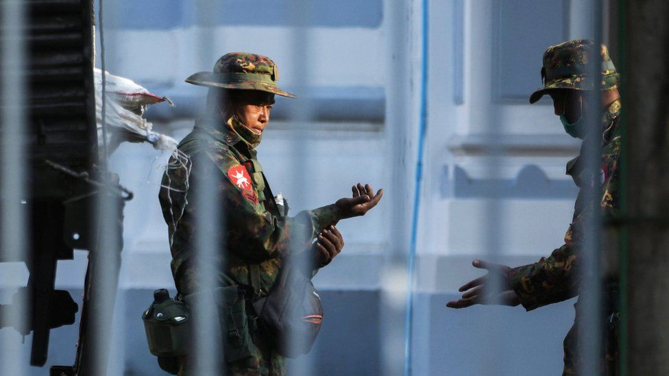 Myanmar soldiers are seen inside City Hall in Yangon, Myanmar February 1, 2021