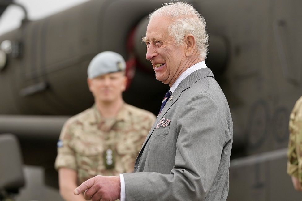 King Charles III speaks to service personnel, during a visit to the Army Aviation Centre at Middle Wallop, Hampshire