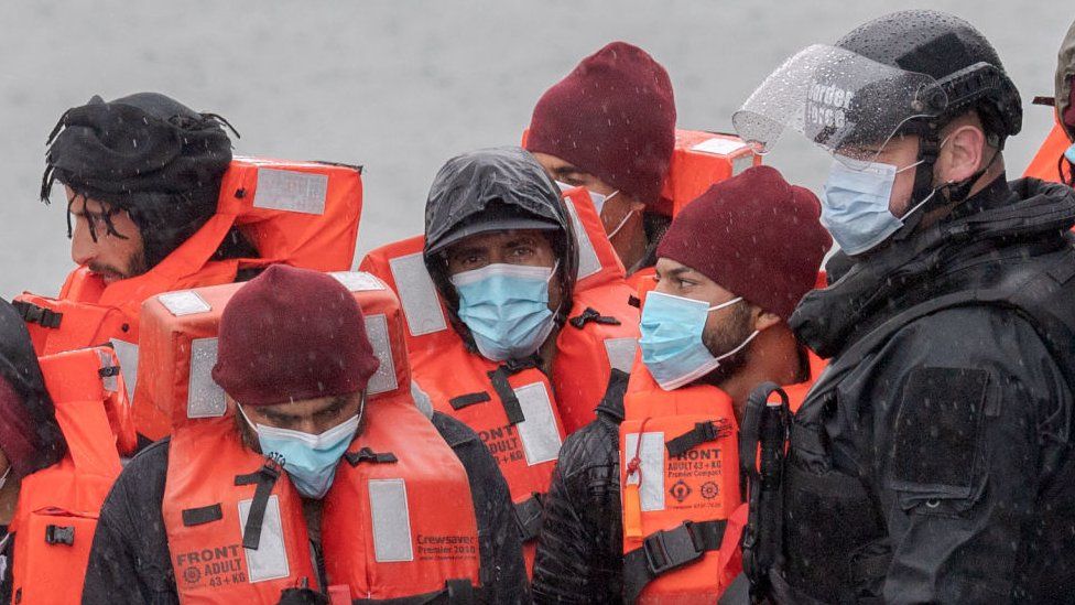 Migrants at Dover Harbour in May after being picked from a boat in the Channel by Border Force