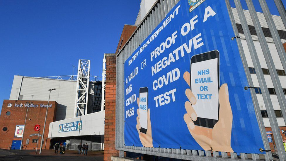 A banner requesting Covid passes for entry to Blackburn Rovers football club