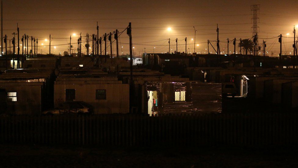 Power lines pictured at night in Khayelitsha township, South Africa - Tuesday 10 July 2018