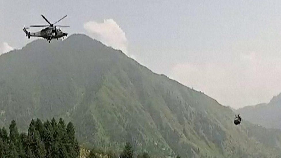 Helicopter hovers near Pakistan cable car