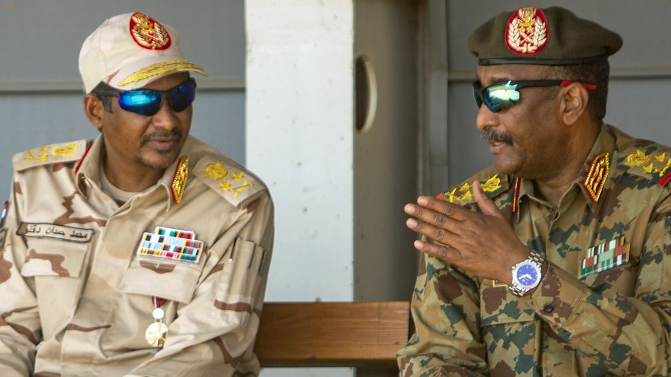 Gen Burhan (R) and Hemedti (L) pictured in Khartoum in September 2021