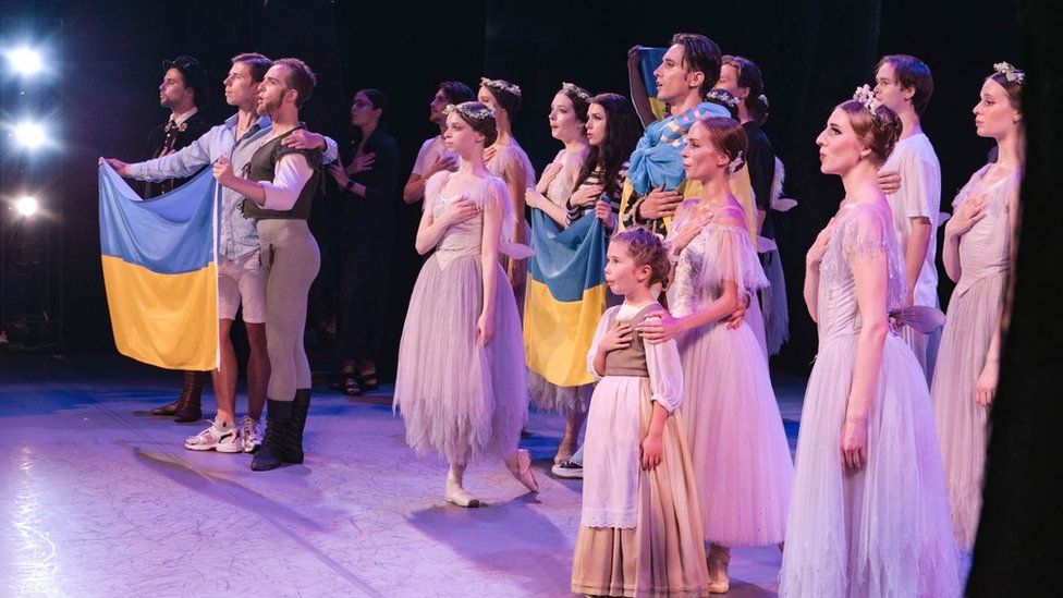 The United Ukrainian Ballet displaying their flag