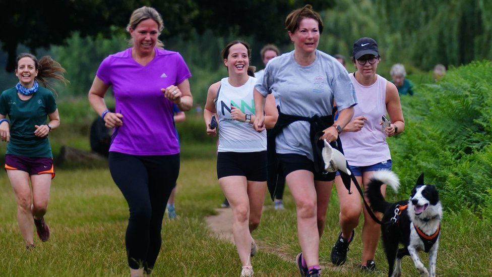 A dog joined runners at Bushy Park