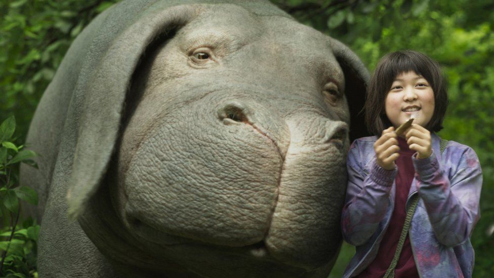 Download Caption: A Beautiful Friendship - Okja and Mija Wallpaper |  Wallpapers.com