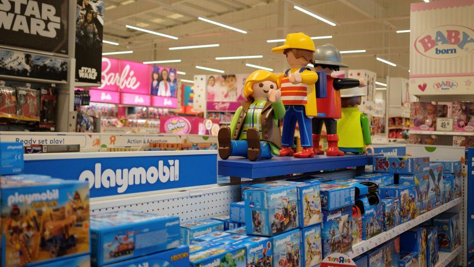 A range of childrens toys displayed in a branch of Toys R Us
