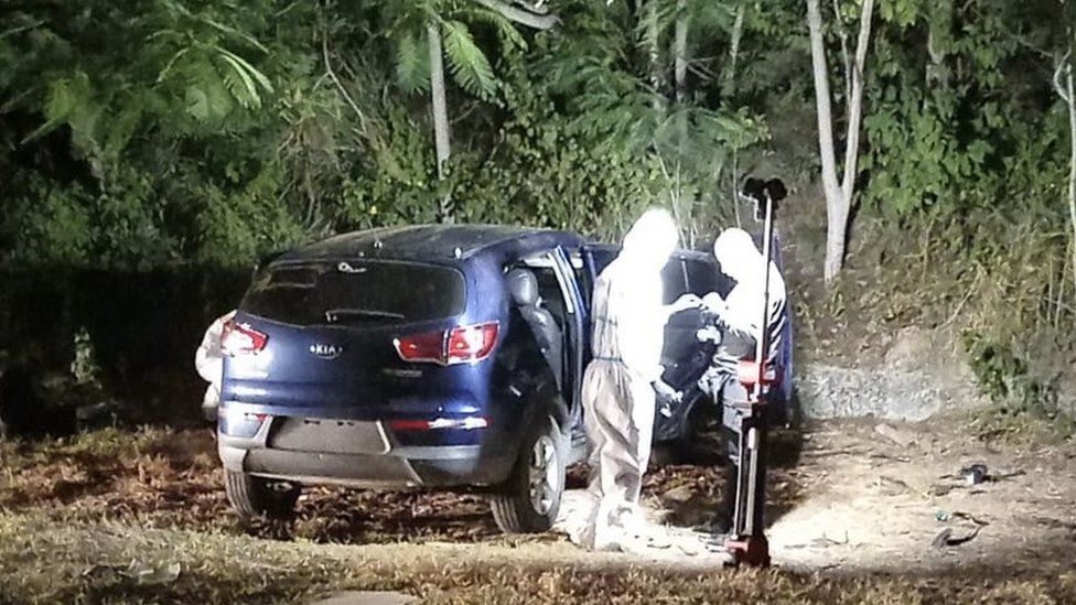 View of the car in which the bodies were found
