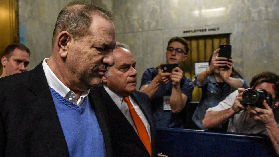 Harvey Weinstein exits the court room with his lawyer Benjamin Brafman after his arraignment at Manhattan Criminal Court on May 25, 2018