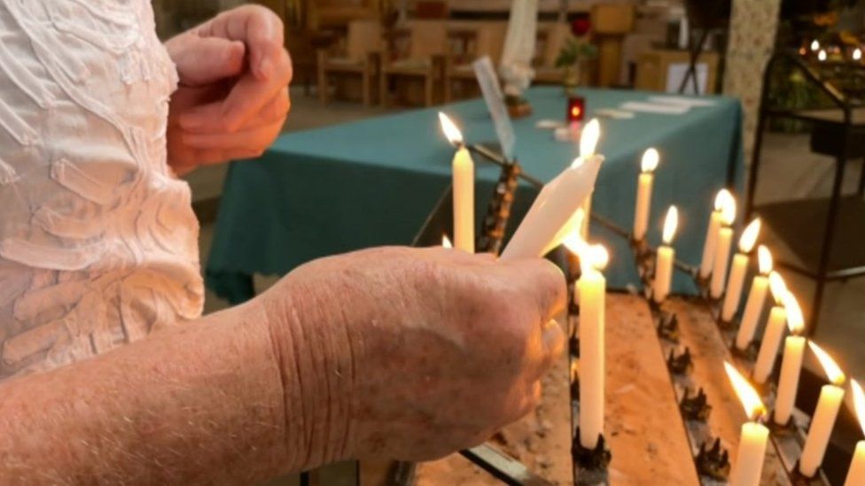 Candles lit at St Botolph's Church