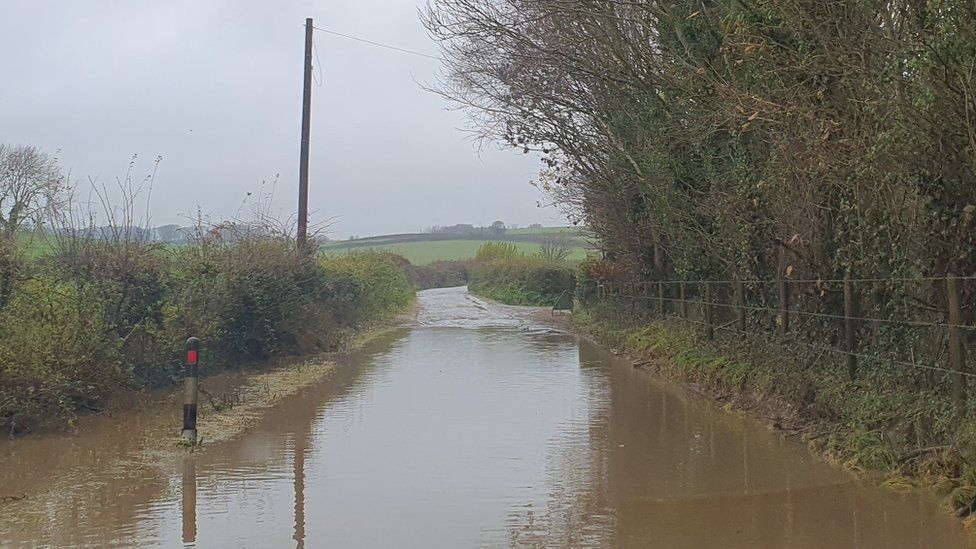 A flooded rural lane